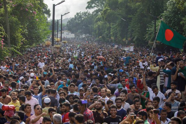 Bangladesh anti-government protester gather as they storm