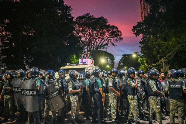 Bangladesh riot police take a position in front of