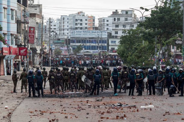 Bangladeshi soldiers take a position at the Mohammadpur area