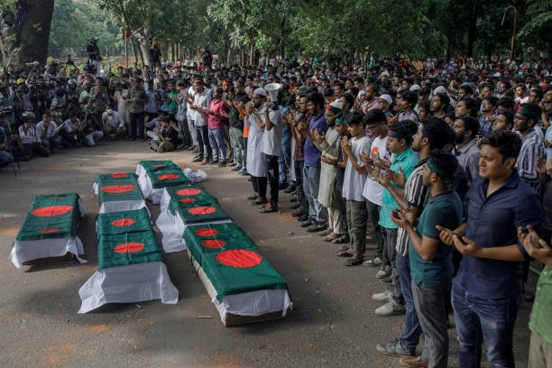 Anti-quota protester student's join in funeral prayer with