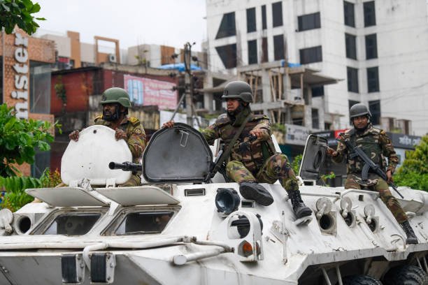 Bangladeshi soldiers are seen patrolling in the Bijoy Sarani