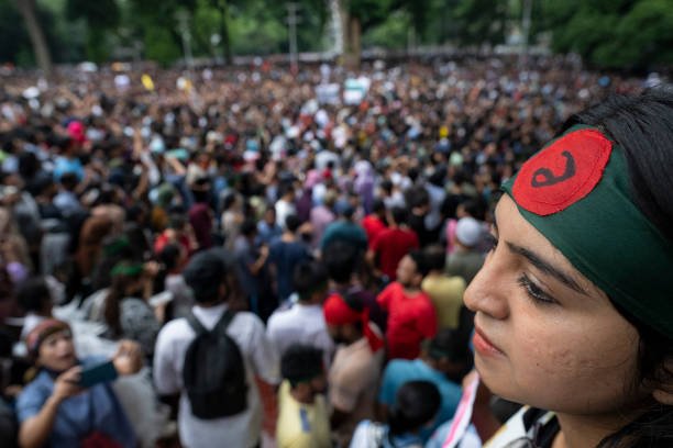 Thousands of protesters gather during a protest titled "One