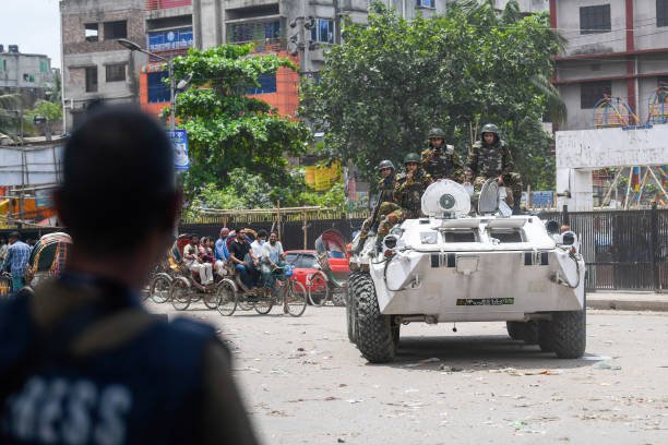 Bangladeshi soldiers are seen patrolling during the national