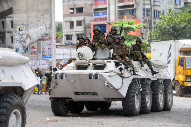 Bangladeshi soldiers are seen patrolling during the national