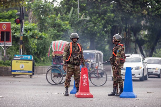 Bangladeshi soldiers stand on guard near Parliament house