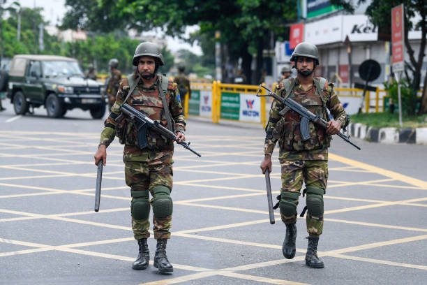 Bangladeshi soldiers are seen patrolling during the national