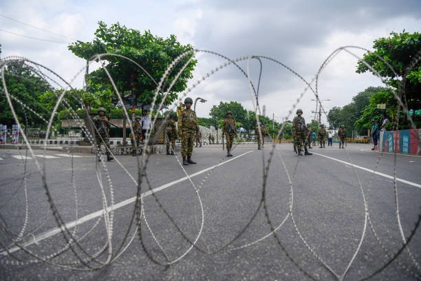 Bangladeshi soldiers stand on guard during the national