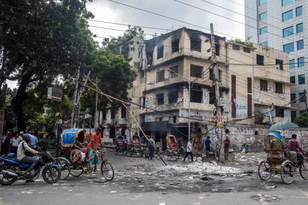 Smoke billows near burnt Awami League party office as anti-