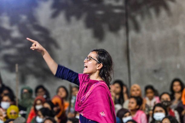 A female student shouts in front of Begum Rokeya Hall,