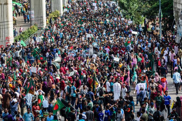 A crowd of protesters marches during a demonstration at