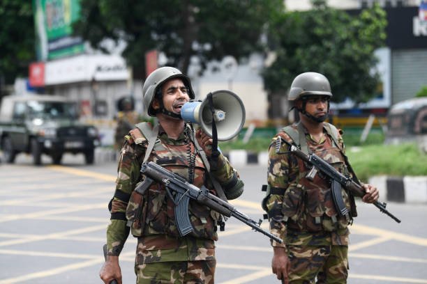 Bangladeshi soldiers are seen patrolling during the national