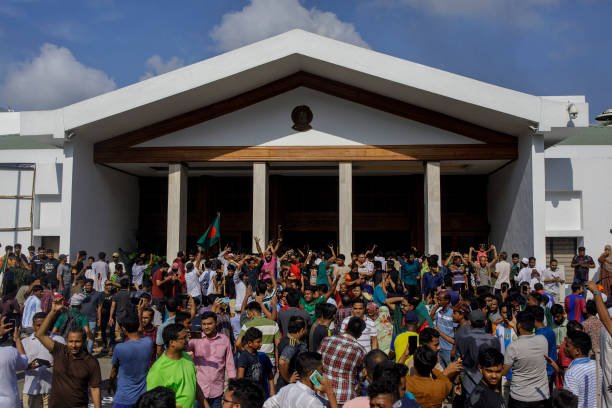 Bangladesh anti-government protester gather as they storm