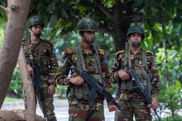 Bangladeshi soldiers stand on guard near Parliament house