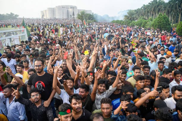 Anti-government protesters gather at the parliament house