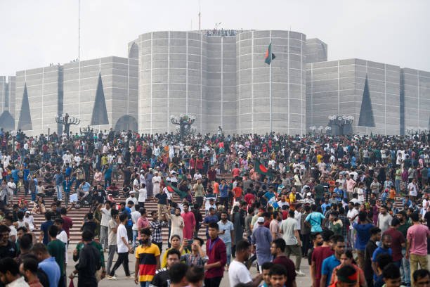 Anti-government protesters gather at the parliament house