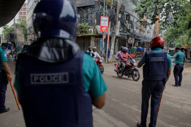 Members of the Bangladesh police setup a check post at Wari
