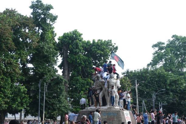 Anti-government protestors gather at the parliament house in Dhaka