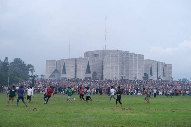 Anti-government protestors gather at the parliament house in Dhaka