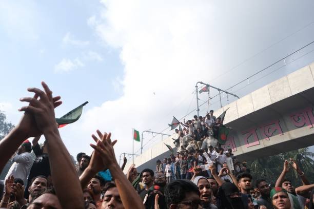 Anti-government protestors gather at the parliament house in Dhaka