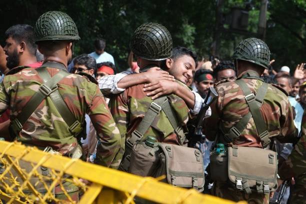 Anti-government protestors gather at the parliament house in Dhaka