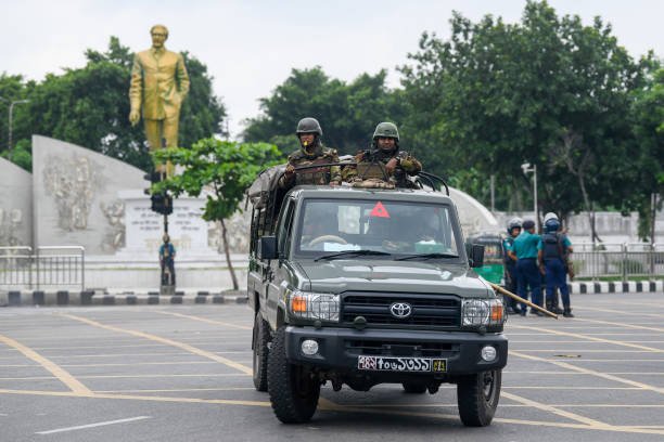 Bangladeshi soldiers are seen patrolling in the Bijoy Sarani