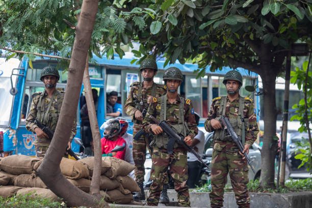 Bangladeshi soldiers stand on guard near Parliament house